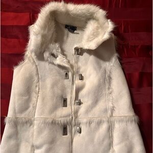 Never worn before Cream colored vest buttons down the middle and a fur collar.